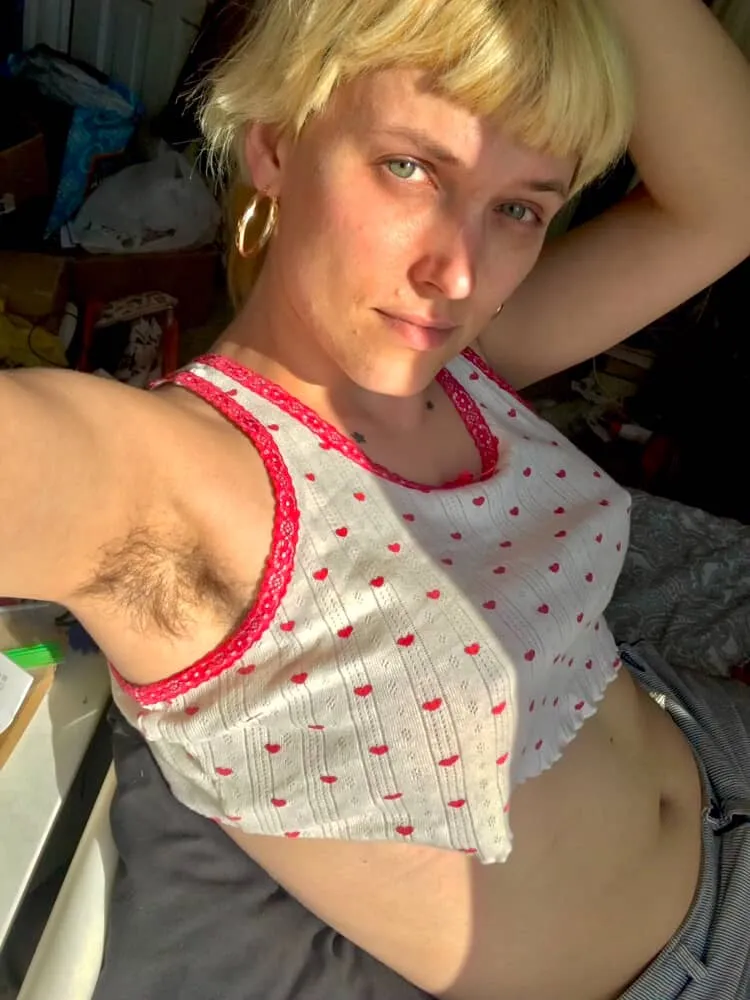 Woman sitting looking at camera